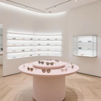 Présentoir Optique Moderne Blanc Courbé de Luxe avec Éclairage LED, Vitrine à Lunettes à Niveaux pour Magasin de Détail et Showroom