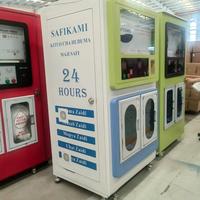 Distributeur d'eau purifiée et de glaçons en libre-service pour l'extérieur avec ensachage automatique pour l'eau potable