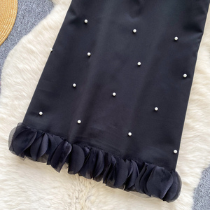 Elegante abito senza maniche in pizzo decorato con perle di ispirazione francese alla moda femminile di lusso estivo per uno stile femminile Chic