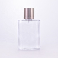 Bouteilles de parfum en verre à pompe à sertir à capuchon mat de 100mL à épaule plate avec courbe