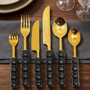 Ensemble d'ustensiles de luxe dorés avec des poignées noires élégantes en forme de bulle pour des dîners raffinés et des présentations de table élégantes - Product Image 4