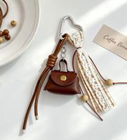 En gros, Mini porte-monnaie mignon en similicuir, porte-clés, breloque de sac à ruban et pompon, pendentif de sac à main vintage, fourniture de bijoux