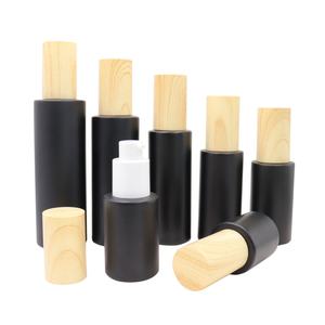 Pot vide en verre noir mat, flacon pulvérisateur, pot cosmétique pour crème et lotion, avec couvercle en plastique imitation bois, flacon de voyage rechargeable - Product Image 2