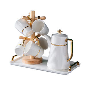 European-style <b>tea</b> <b>set</b>, high-end gift for the living room, gold-painted ceramic water <b>set</b>, <b>cup</b> <b>set</b>, <b>cup</b> handle and tray - Product Image 1