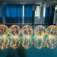 Sphère LED gonflable en PVC personnalisée, boule gonflable transparente avec lumières LED intégrées pour la décoration de plafond de fête, d'événement ou de centre commercial