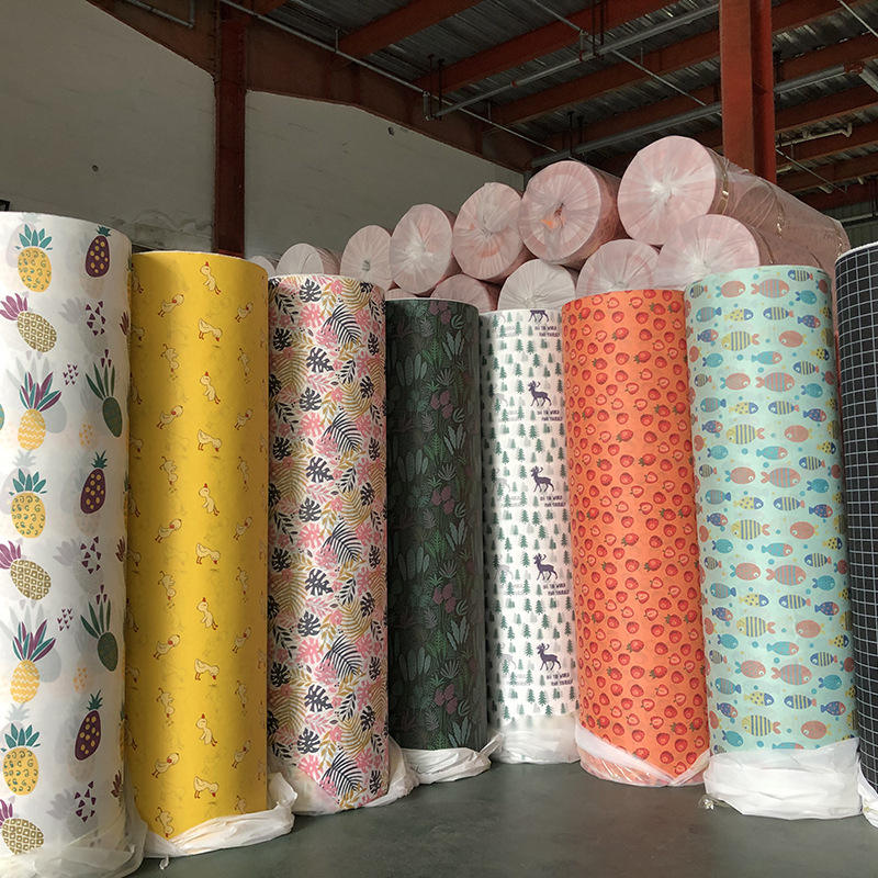 Pabrik Pasokan 100% Polypropylene Dicetak Kain Bukan Tenunan Pp Spunbond Dicetak Kain Non Woven