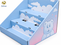 Support d'affichage pour bonbons en carton ondulé bleu personnalisé pour la promotion de snacks en supermarché