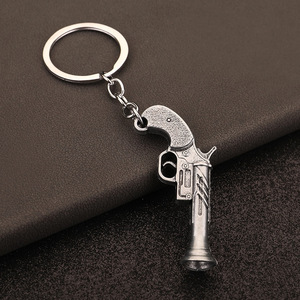 Yujiantong Jedi Battle Royale serie periferica pace piccola pistola in metallo modello giocattolo, squisito portachiavi ciondolo - Product Image 4