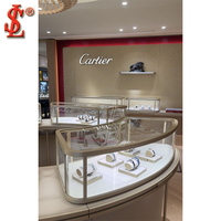 Vitrine de présentation de bijoux moderne et populaire, conçue sur mesure, en bois, avec éclairage LED et couvercle en verre