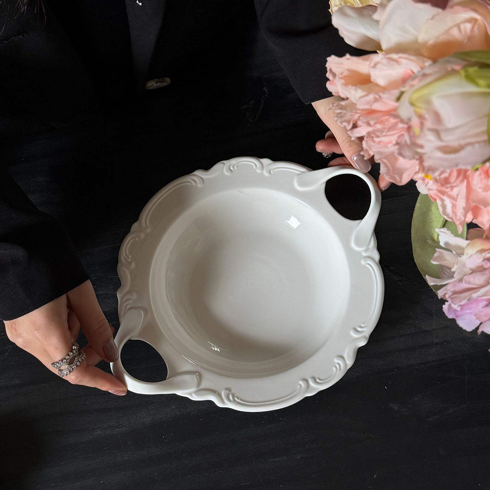 A white round double-ear soup plate