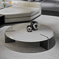 Table basse minimaliste Keel avec plateau en marbre sable et base en acier inoxydable noir, personnalisable, mobilier de salon moderne et luxueux