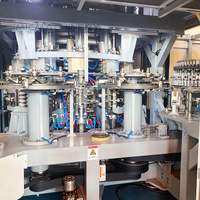 Machine de soufflage-remplissage-bouchage de blocs combinés PET à commande servo synchrone pour bouteilles en plastique de boissons et d'eau