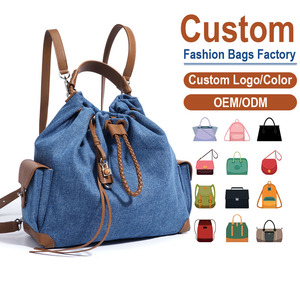 Mochila de mezclilla – Azul con ribete marrón y cordón tejido |   Correas de hombro ajustables y asa superior | Ideal para Desplazamientos Diarios - Product Image 1