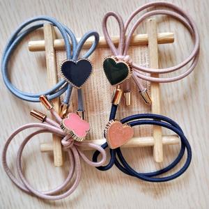 Coletero coreano de colores S152, coletero moderno con forma de corazón y trébol de cuatro hojas, accesorio para el cabello al por mayor de tienda de un dólar. - Product Image 5