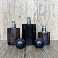30ml-100ml Bouteille de parfum en verre à encre noire Pulvérisateur à pompe carrée avec surface de gravure acide et glaçage pour usage cosmétique