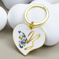 Porte-clés en métal personnalisé en forme de cœur rond, logo personnalisé, plaqué or, porte-clés rotatif pour cadeau de mariage