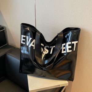 <span class=keywords><strong>Sac</strong></span> fourre-tout à bandoulière de style étranger avec lettres de grande capacité <span class=keywords><strong>Sac</strong></span> à main de style étranger de haute qualité à la mode et polyvalent Exclusif - Product Image 1