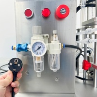 Machine de remplissage de liquide semi-automatique à 2 têtes, machine de remplissage de parfum pneumatique de bureau, machine de remplissage de bouteilles de liquide pour animaux de compagnie