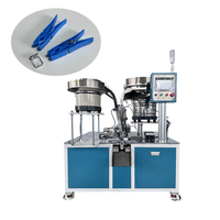 Machine d'assemblage de pinces à vêtements PLC et moteur entièrement automatique à grande vitesse avec garantie d'un an pour usage industriel