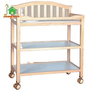 <span class=keywords><strong>Table</strong></span> à <span class=keywords><strong>langer</strong></span> moderne en bois pour bébé avec serrures de sécurité Étagères à roulettes amovibles pour nourrissons pour chambre à coucher - Product Image 1