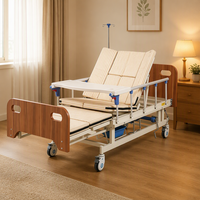 Lit médical à manivelle avec dossier inclinable et contrôle de descente, cadre en bois avec barrières latérales, pour usage en chambre de patient