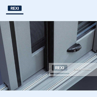 Fenêtre coulissante verticale double vitrage en aluminium à rupture de pont thermique, faible émissivité, étanche et coupe-vent pour salon, balcon, chambre