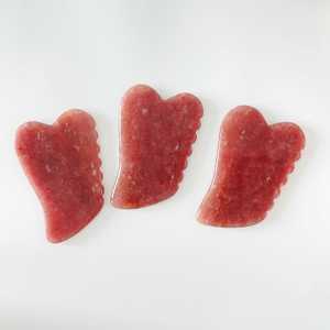 Cristal naturel de fraise en jade avec picots pour massage corporel - Product Image 1