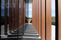 Poutre en bois lamellé-collé à haute résistance pour la construction de charpentes en bois lourd et les systèmes de travées de toit à grande portée