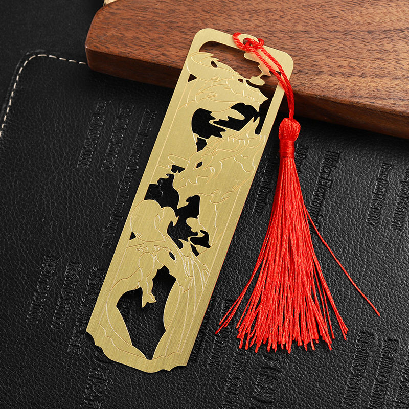 Marcador de oro con borla