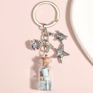 Llavero marino con concha, estrella de mar y caracola, botella de líquido en movimiento, llaveros de los deseos, regalos de amistad, joyería hecha a mano - Product Image 1