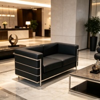 Direktlieferung ab Werk Modulare Wohnzimmer-Sofas aus PU-Leder mit Edelstahlrahmen Sofagarnitur Möbel für Zuhause & Gewerbe