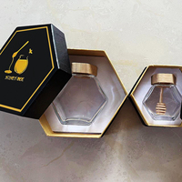 Vente en gros boîtes d'emballage cadeau de bouteille de pot de miel personnalisées boîte d'emballage cadeau d'emballage de miel d'abeille en papier noir en forme d'hexagone
