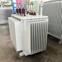 Prix du fabricant 50KVA 100 KVA 200KVA 11KV à 400V 50hz Dyn11 transformateur immergé dans l'huile triphasé