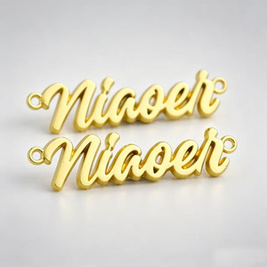 Étiquette métallique en relief 3D sur mesure, découpée au laser, forme ovale, pour vêtements. - Product Image 1