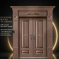 Porte d'entrée de sécurité à double battant de style européen avec panneaux à rainures et poignées à levier pour grandes maisons