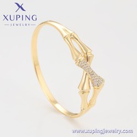 X000892620 XUPING Bracelet jonc articulé en alliage de cuivre plaqué or 14K avec micro-pavé de zircon, motif nœud de bambou, bijou élégant et tendance