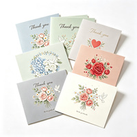Tarjetas de Felicitación Plegables con Opción de Personalización Un método de decoración de bajo costo consiste en pegar números con etiquetas de cristal dorado.