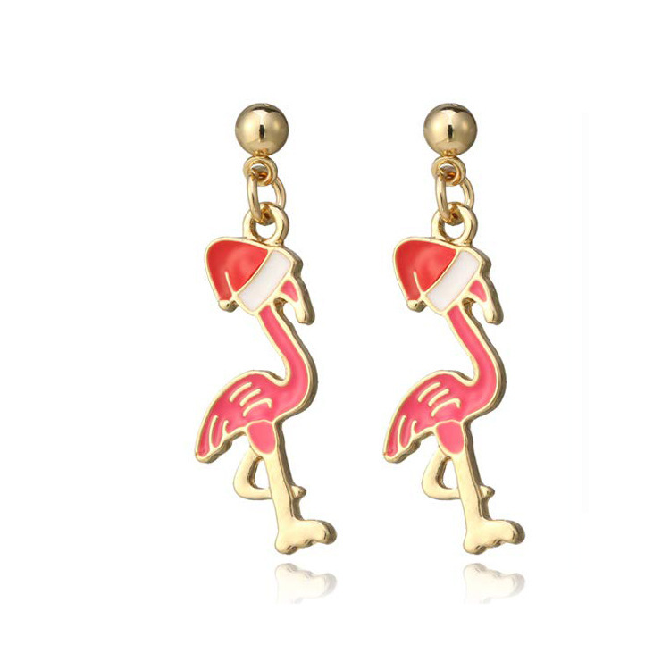 Boucles d'oreilles de Noël portant chapeau flamant rose