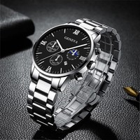 Montre d'affaires pour homme avec boîtier en alliage, bracelet à aiguilles, calendrier à trois trous, chiffres romains, mouvement à quartz, collier, bracelet et bague assortis