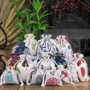 Vente en gros de sacs en coton lin bleu blanc de style chinois petit bouquet de pantalons à poche à rabat organisation de stockage de cadeaux de bijoux recyclables - Product Image 1