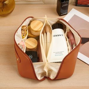 Ulikeke Wholesale Custom Logo Waterproof Toiletry Cosmetic Bags PU Leather <b>Pillow</b> Cosmetic Travel Makeup Bag With Zipper - Product Image 2