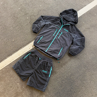 Ensemble de survêtement OEM de haute qualité, coupe-vent résistant à l'eau, short en nylon, design personnalisé, veste coupe-vent et short, ensemble de jogging