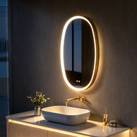 Espejo de Baño Largo Ovalado con Marco Dorado, LED Inteligente Antivaho, Retroiluminado, Espejo de Vanidad de Pared para Proyectos Residenciales y Hoteles