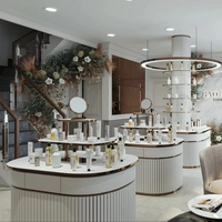 Conception d'intérieur moderne pour salon de beauté, comptoir de présentation de maquillage sur mesure, fabricant de mobilier pour magasin de cosmétiques