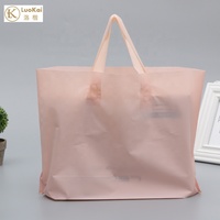 Sac en plastique découpé avec poignée en LDPE/HDPE imprimé avec un logo personnalisé pour l'emballage des vêtements et des chaussures, adapté à la sérigraphie sur surfaces