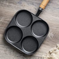 Poêle à œufs en fonte pré-culottée antiadhésive à 4 trous avec manche en bois pour le petit-déjeuner et la préparation de burgers