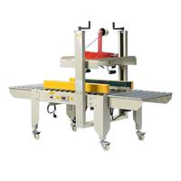 Machine de cerclage et de scellage automatique électrique à prix d'usine pour boîtes, cartons de boissons et vêtements