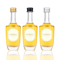 Mini-bouteille roll-on en verre transparent de 50 ml avec bouchon à vis pour échantillons de vodka et whisky