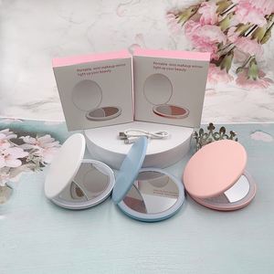 Mini miroir de maquillage circulaire LED lumineux portable pliable avec lumière, petit miroir cosmétique et pince à cils - Product Image 1