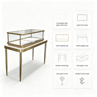 Vitrine de présentation de bijoux rectangulaire de luxe, cadre en métal fin doré, comptoir à bijoux en verre trempé avec éclairage LED, métal élancé